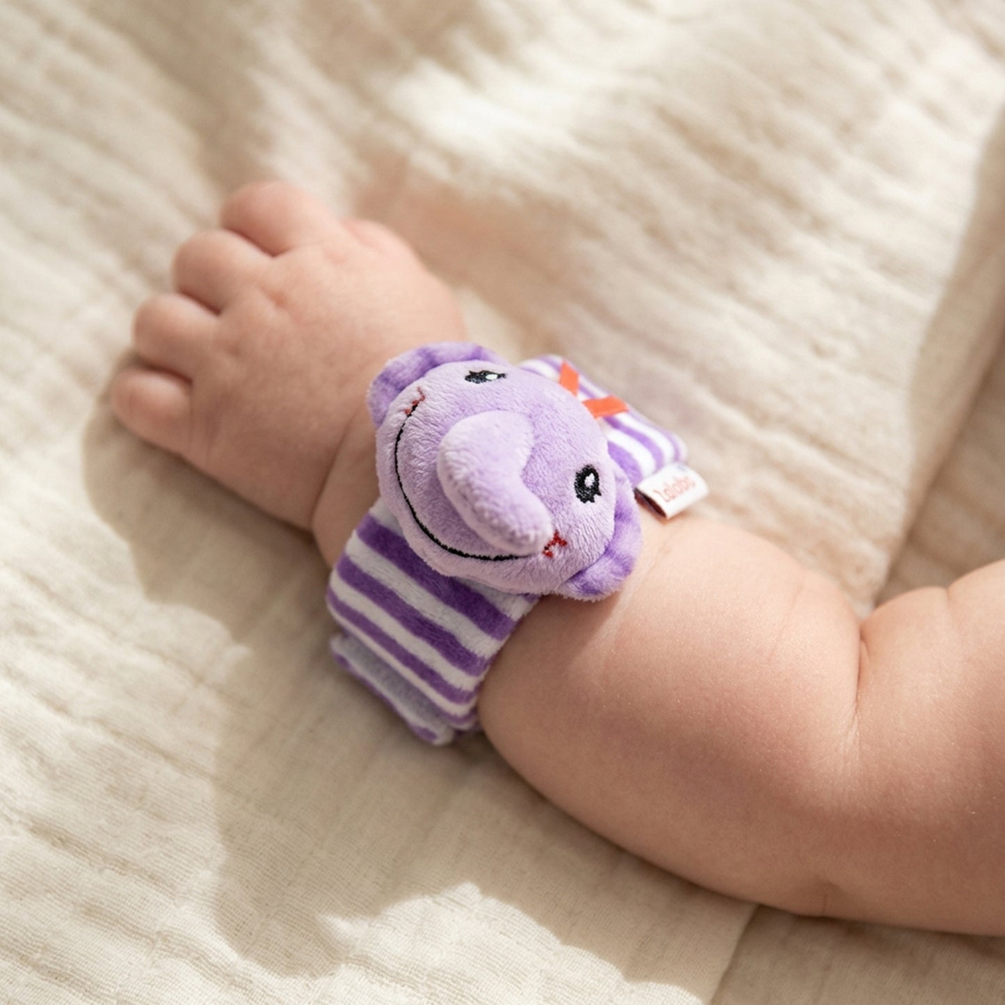 LELEBE PURPLE ELEPHANT RATTLE WRIST TOY